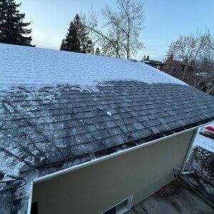 Residential gutter and eavestrough de-icing cable system installed by a professional electrician to eliminate ice dams.